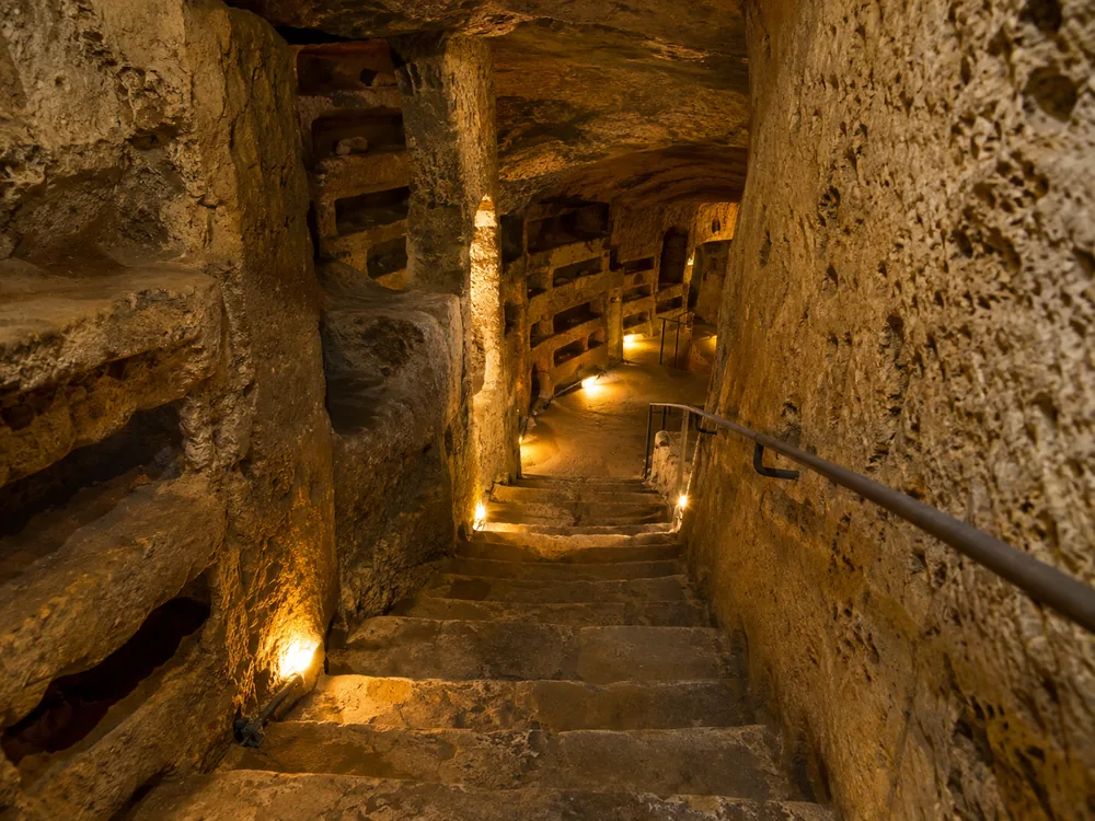 Narrow irregular stairs of the kind that take you the fifty steps down and back